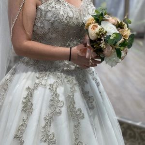 New, never used Truly Bridal wedding gown.